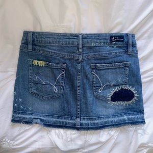 From The Nines vintage Y2K denim mini skirt with colored stitching and patchwork
